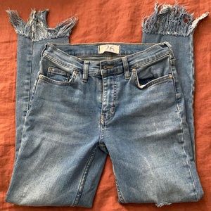 Free People jeans. Slightly distressed legs and distressed hem.